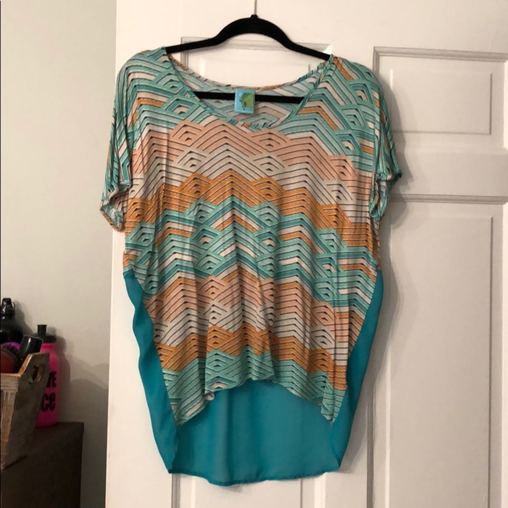 h.i.p. Size small, high low top, sheer back